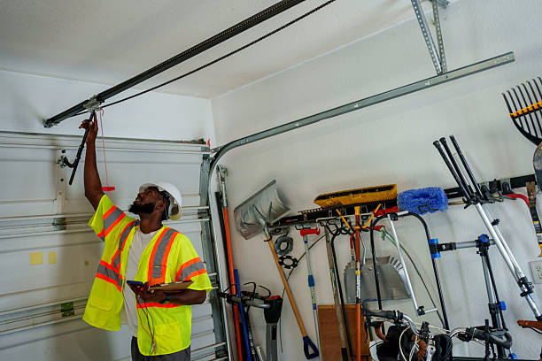 Professional Garage Door Panel Replacement technician working in Kent, WA